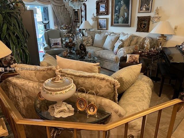 9832 Southwest 27th Terrace Miami, FL 33165 - Photo 6 of 13 a living room with furniture and a fireplace