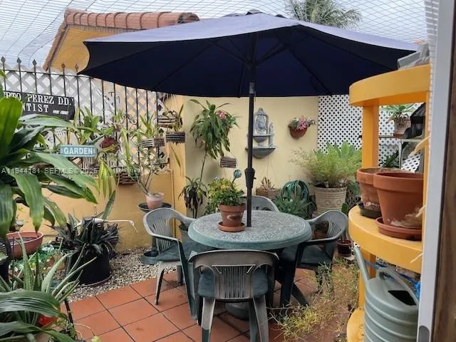 a view of a terrace with seating space