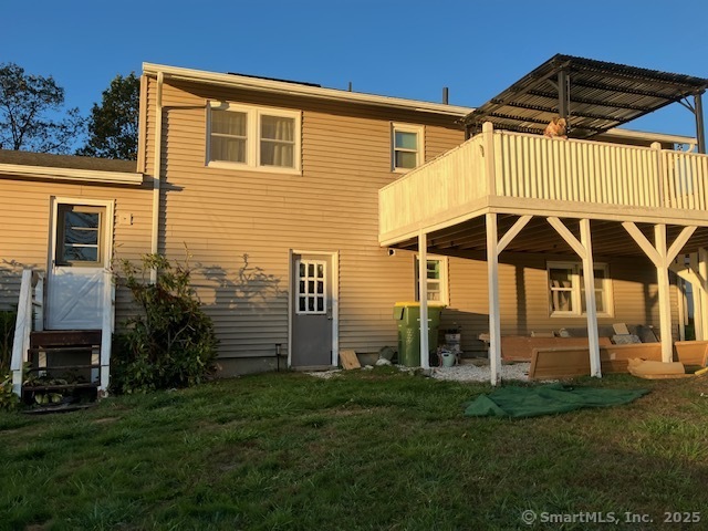 62 Brookfield Road, Unit 2 Waterbury, CT 06704 - Photo 9 of 10 a view of a house with a backyard