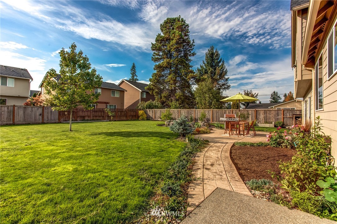 5117 Northeast 11th Street Renton, WA 98059 - Photo 18 of 19 a view of a house with a yard