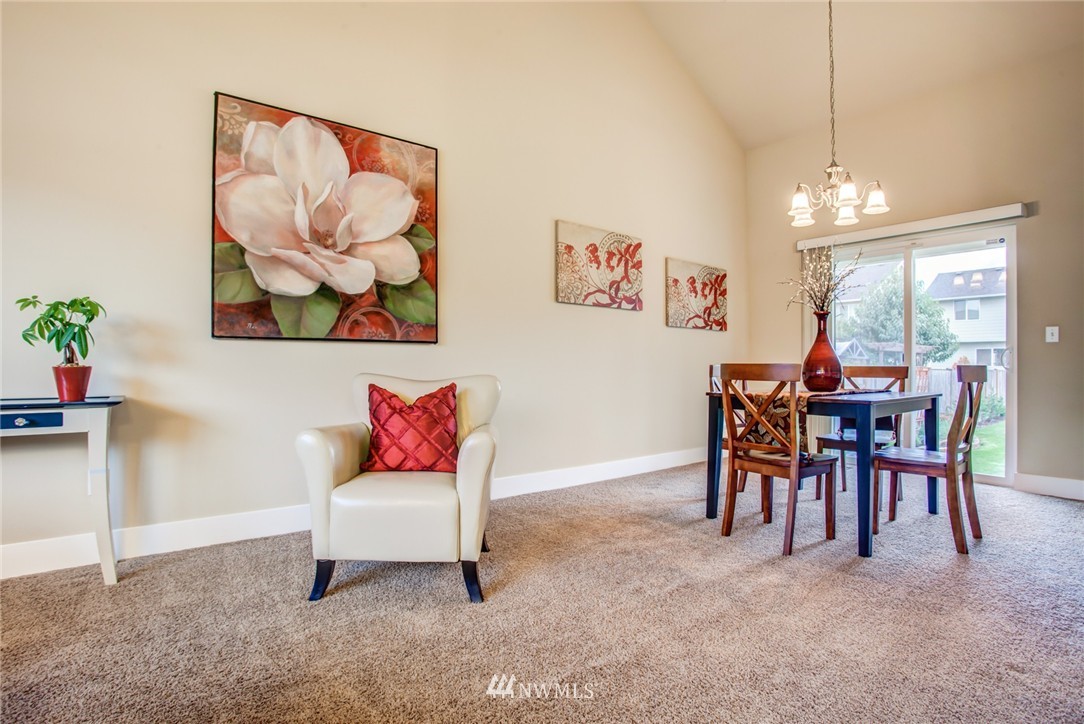 5117 Northeast 11th Street Renton, WA 98059 - Photo 4 of 19 a living room with furniture and a table