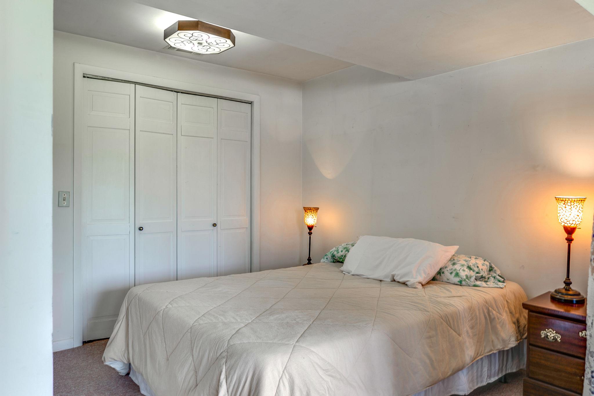 1692 Falling Water Road Sparta, TN 38583 - Photo 21 of 28 a bedroom with a bed and a window