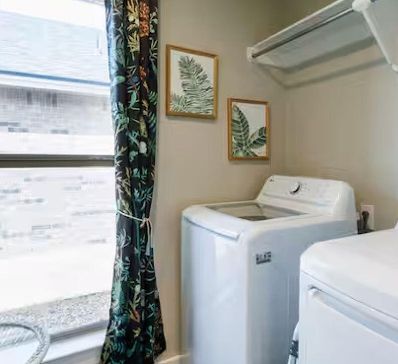 2016 132nd Street Lubbock, TX 79423 - Photo 16 of 28 a utility room with dryer and washer
