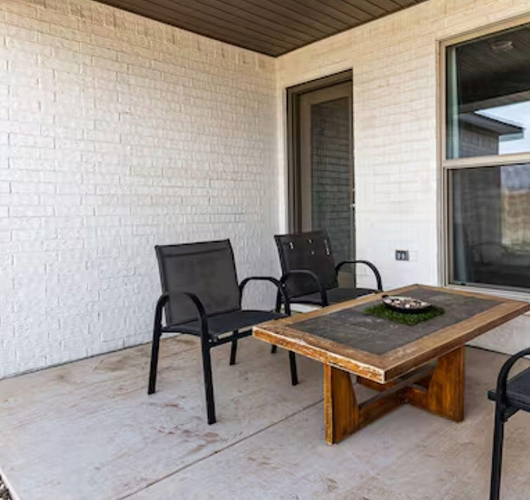 2016 132nd Street Lubbock, TX 79423 - Photo 24 of 28 a view of a workspace with a table and chairs