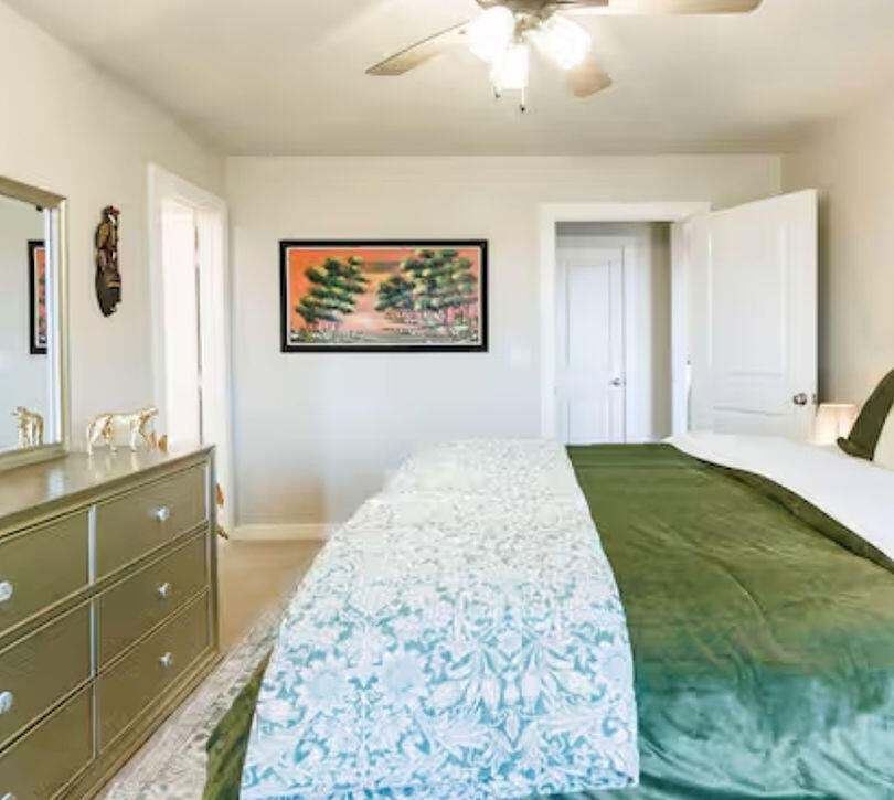 2016 132nd Street Lubbock, TX 79423 - Photo 7 of 28 a bedroom with a bed and a dresser