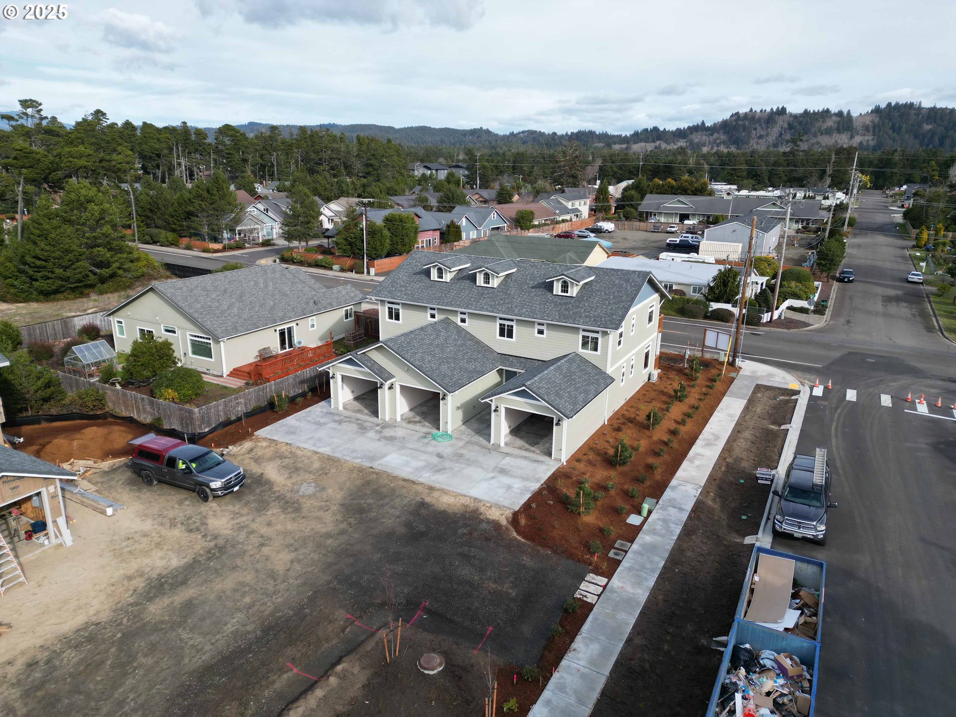 1581 37th Street Florence, OR 97439 - Photo 41 of 47 an aerial view of a yard with horses