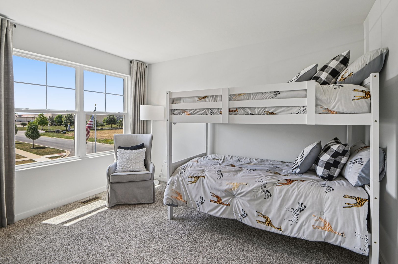 6717 Applegate Drive Plainfield, IL 60586 - Photo 16 of 30 a bedroom with a bed and large window