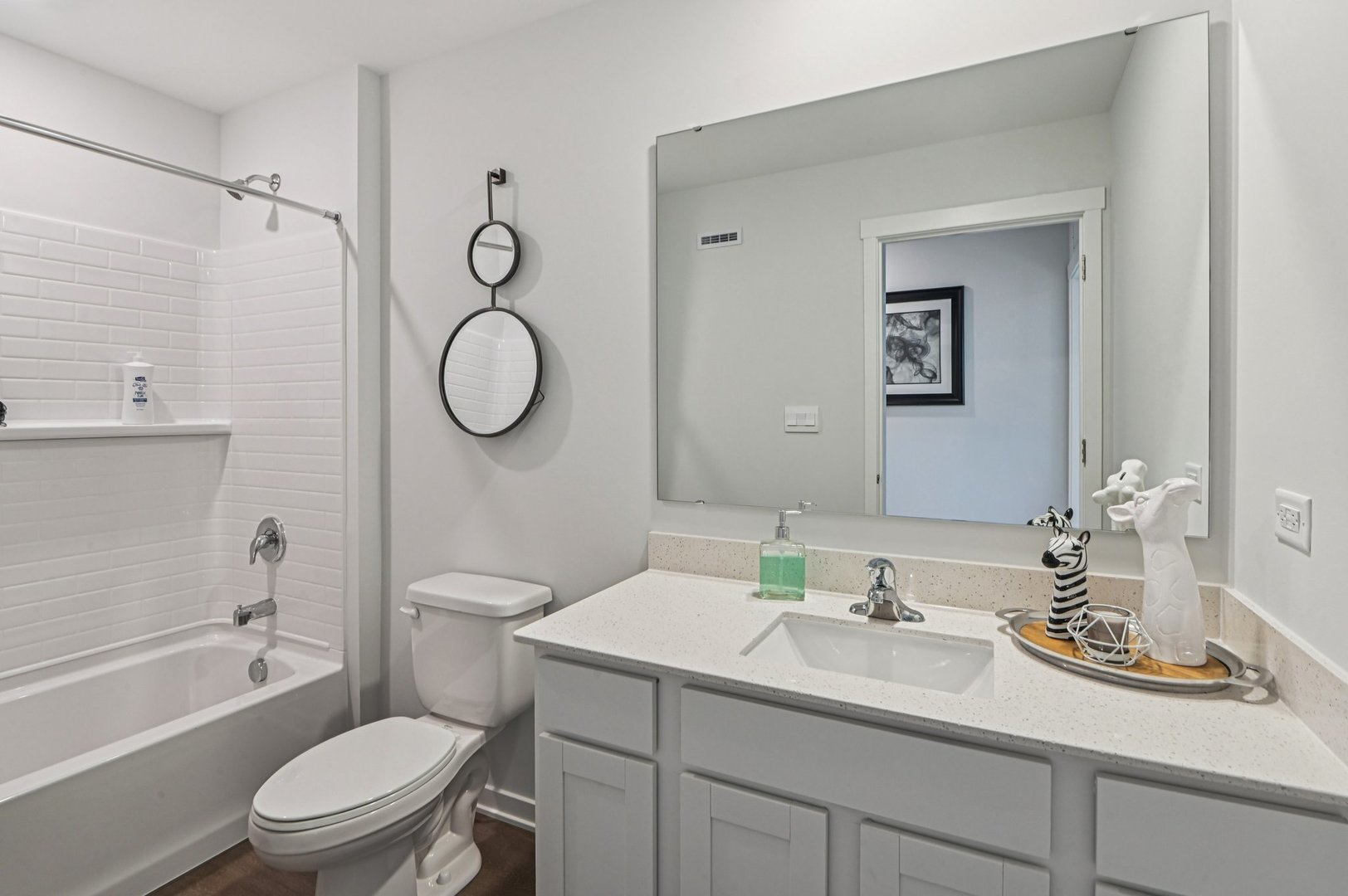 6717 Applegate Drive Plainfield, IL 60586 - Photo 18 of 30 a bathroom with a granite countertop toilet sink and a mirror