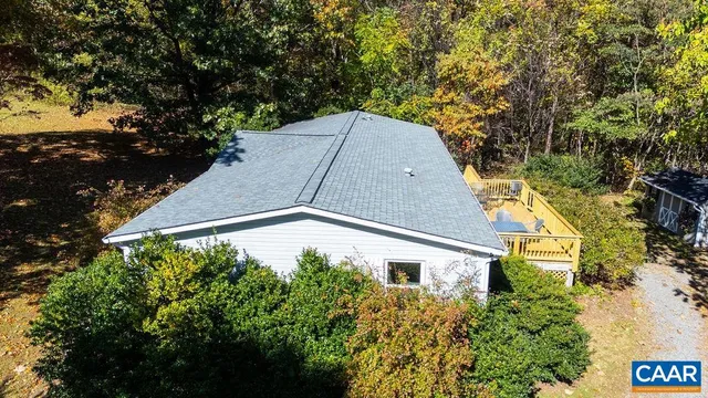 a view of swimming pool with seating area