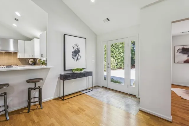 a view of a swimming pool with a yard