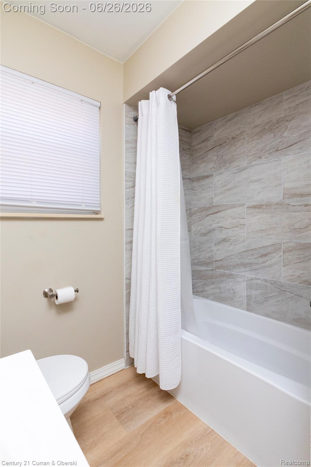 3220 Alice Street Dearborn, MI 48124 - Photo 19 of 39 Tub/shower combination featuring large format tile surround