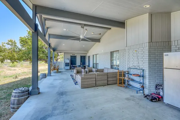 a living room with furniture and a table