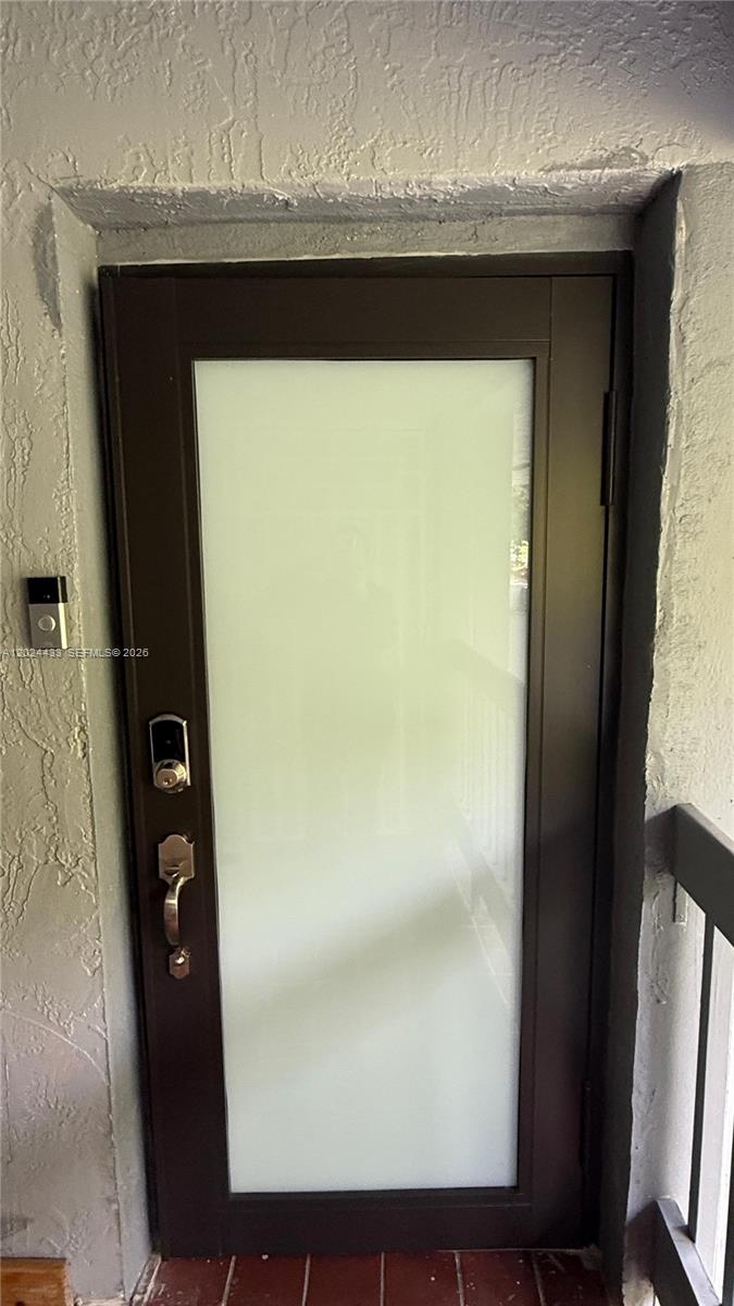 13675 Southwest 62nd Street, Unit 2023 Miami, FL 33183 - Photo 2 of 22 a close view of utility room