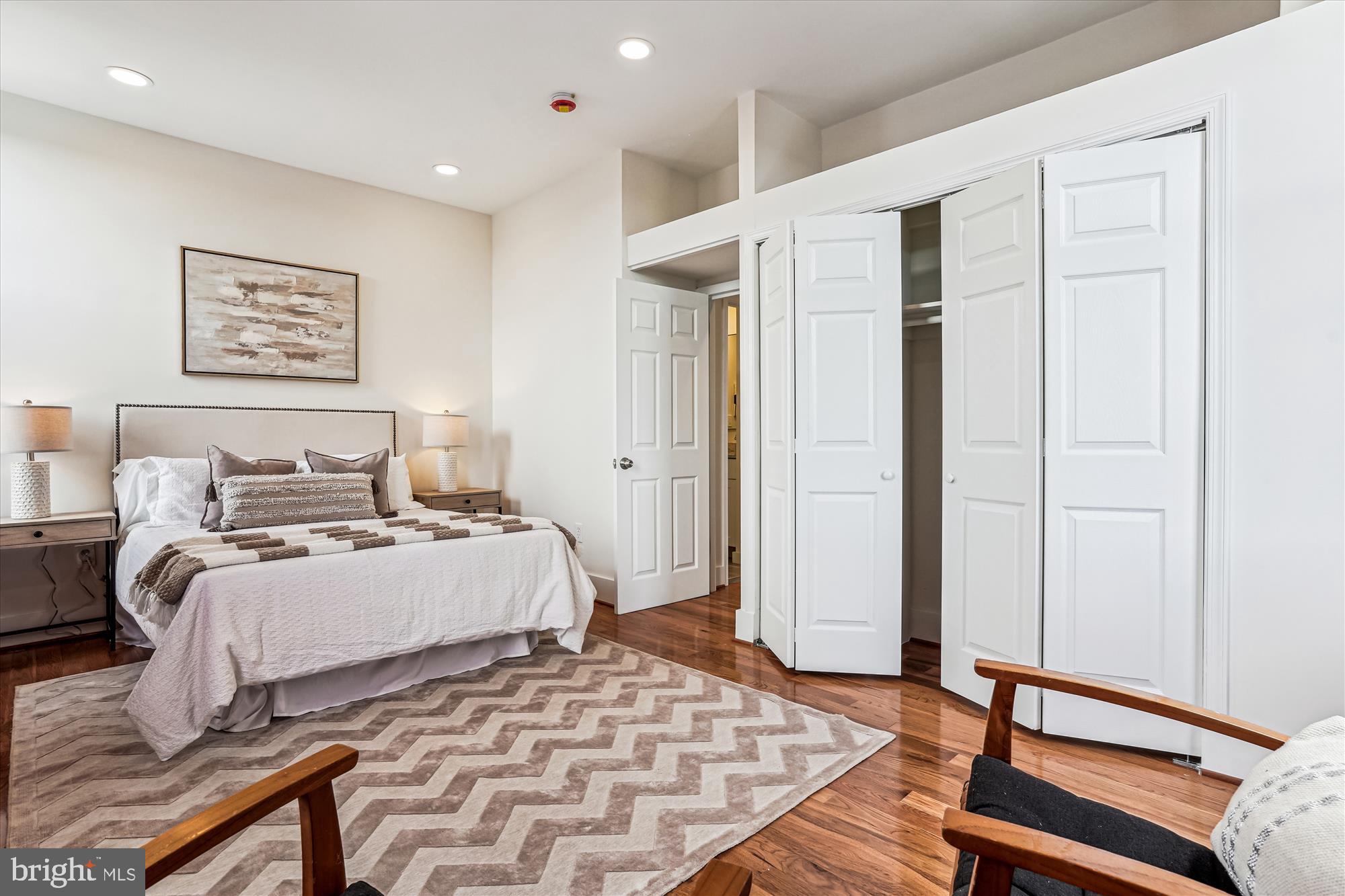 1615 Q Street Northwest, Unit 1012 Washington, DC 20009 - Photo 20 of 39 a bedroom with a bed and a window