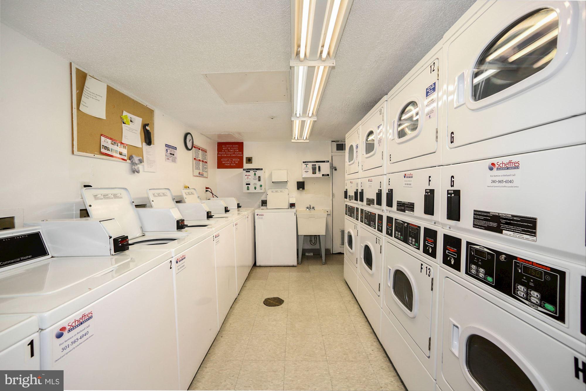 1615 Q Street Northwest, Unit 1012 Washington, DC 20009 - Photo 29 of 39 a utility room with dryer and washer