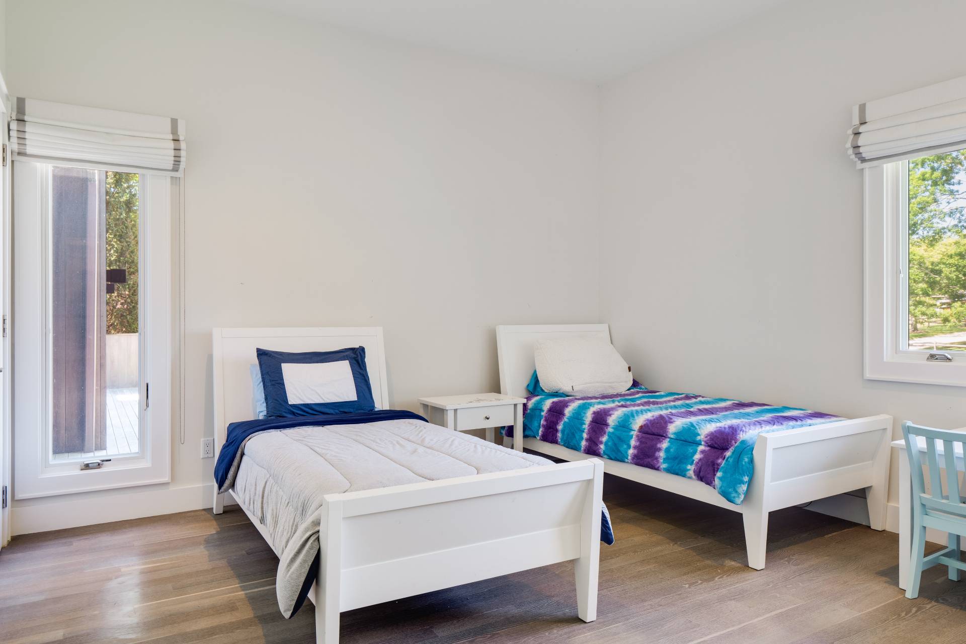 6 Bridle Path Remsenburg, NY 11960 - Photo 11 of 15 a bedroom with two beds and a window