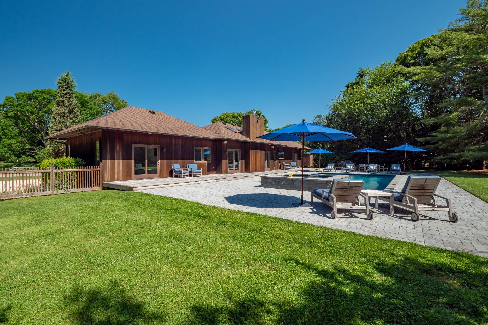 6 Bridle Path Remsenburg, NY 11960 - Photo 14 of 15 a view of a house with garden and sitting area