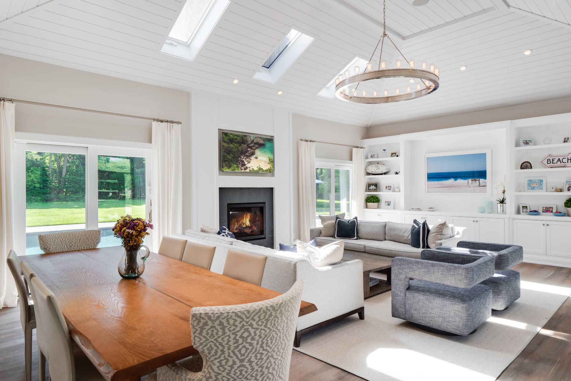 6 Bridle Path Remsenburg, NY 11960 - Photo 4 of 15 a living room with fireplace furniture and a large window