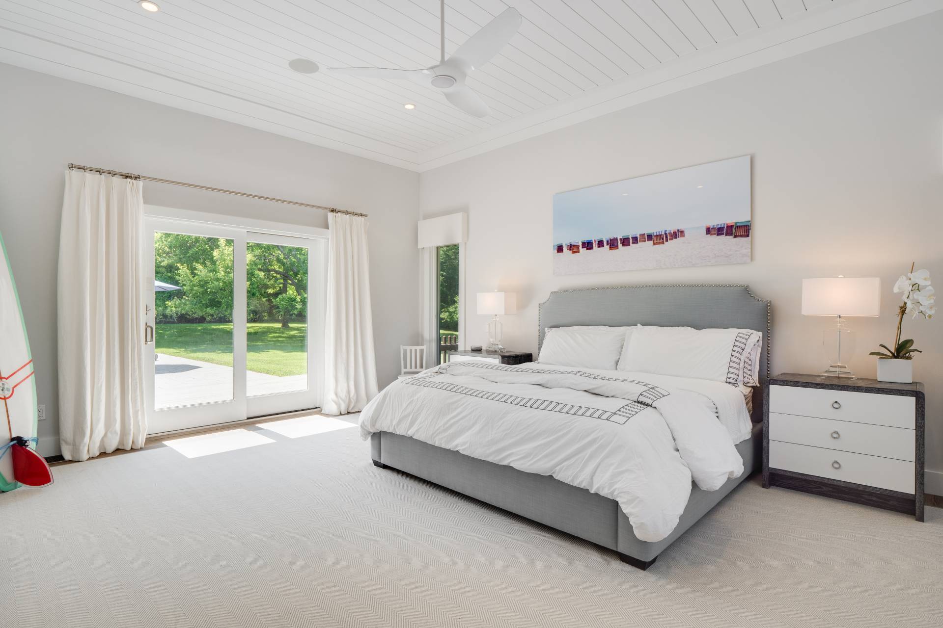 6 Bridle Path Remsenburg, NY 11960 - Photo 7 of 15 a spacious bedroom with a large bed and a large window