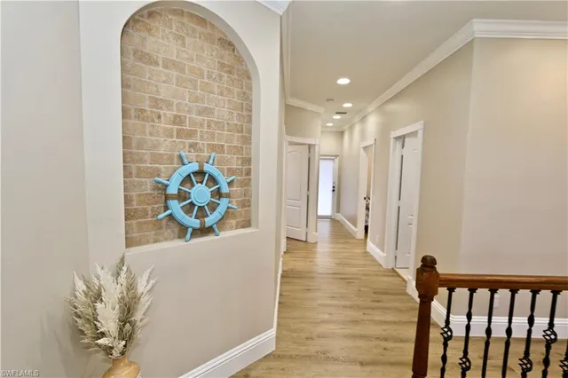 a view of swimming pool from a bathroom