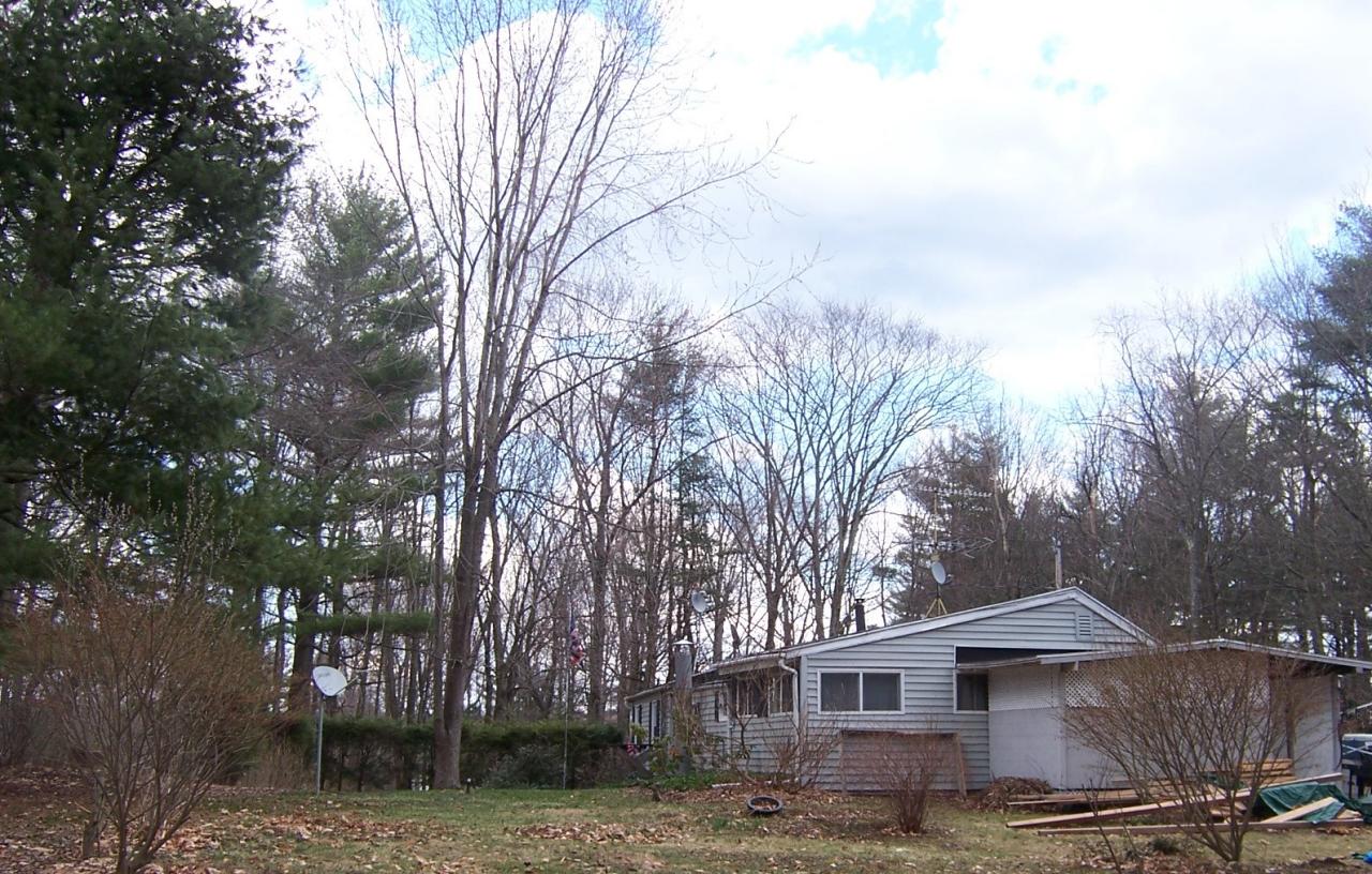 500 Pine Road Otis, MA 01029 - Photo 2 of 10 a view of a house with a yard