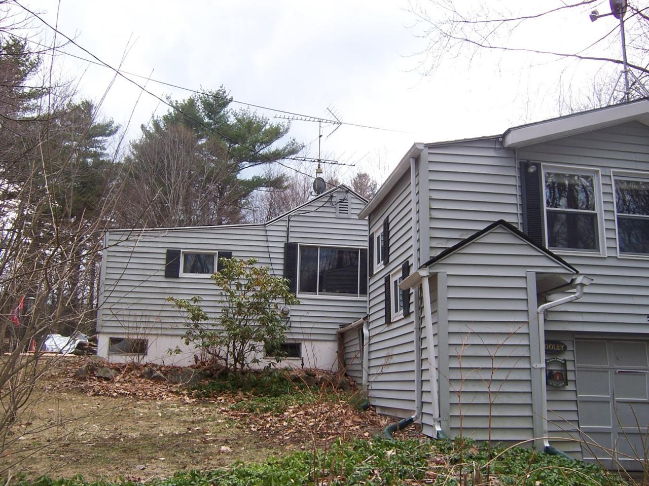 500 Pine Road Otis, MA 01029 - Photo 6 of 10 a view of a house with a yard