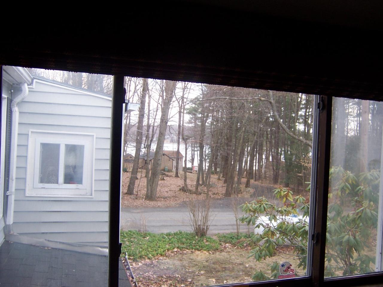 500 Pine Road Otis, MA 01029 - Photo 10 of 10 a view of a room with windows and tree