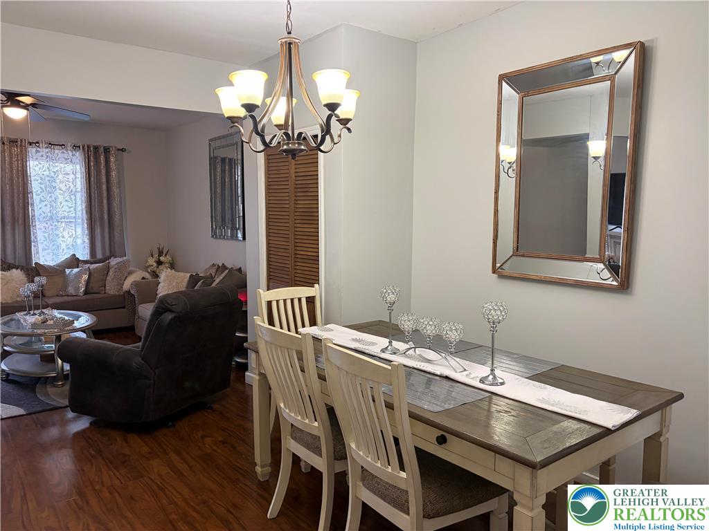633 Maple Street Bethlehem, PA 18018 - Photo 4 of 14 a view of a dining room with furniture wooden floor and chandelier