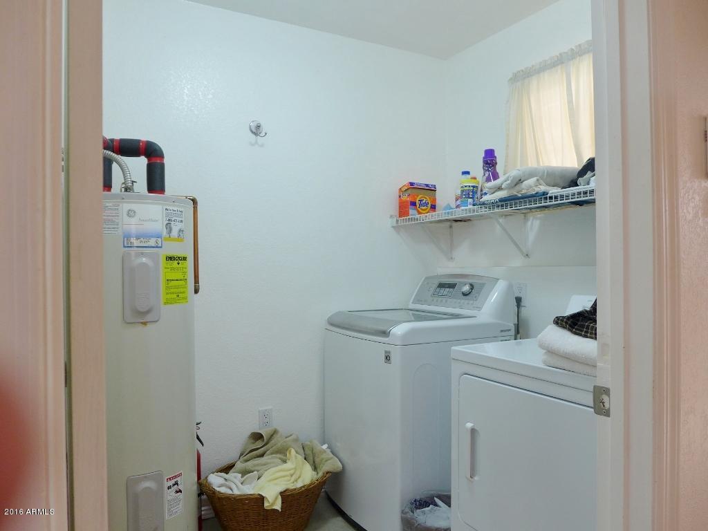 19007 West Roadrunner Road Wittmann, AZ 85361 - Photo 11 of 56 Laundry off the kitchen