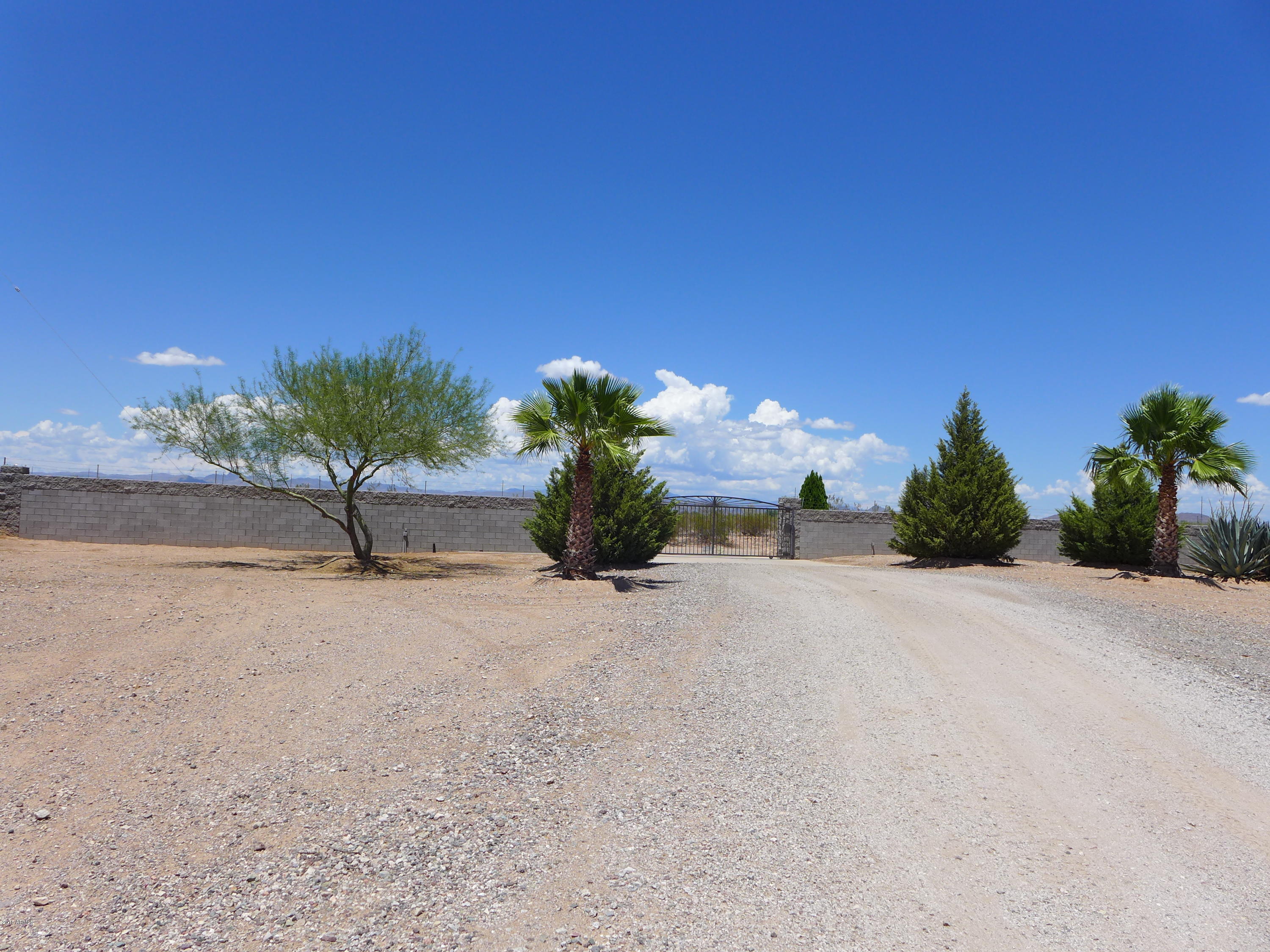 19007 West Roadrunner Road Wittmann, AZ 85361 - Photo 48 of 56 Your entry driveway