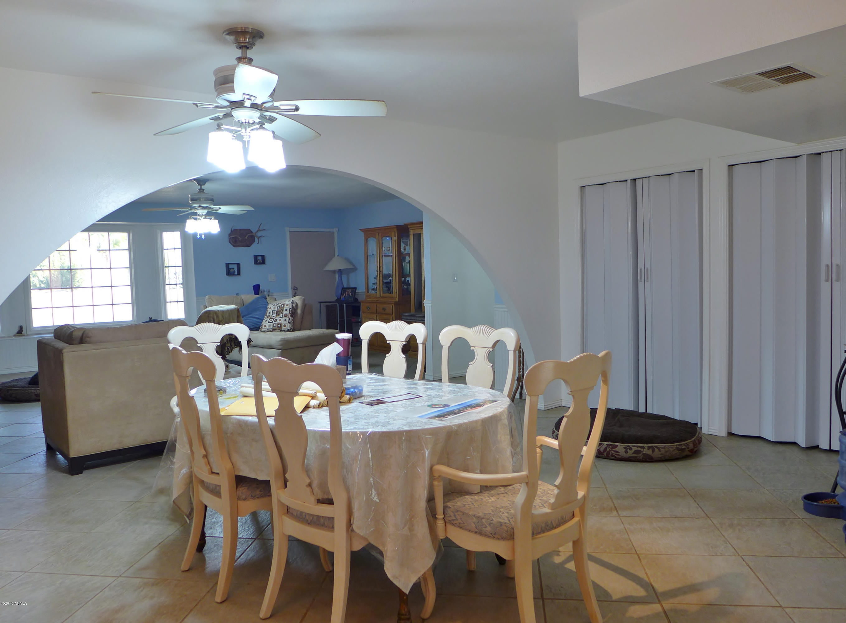 19007 West Roadrunner Road Wittmann, AZ 85361 - Photo 9 of 56 Kitchen to living room