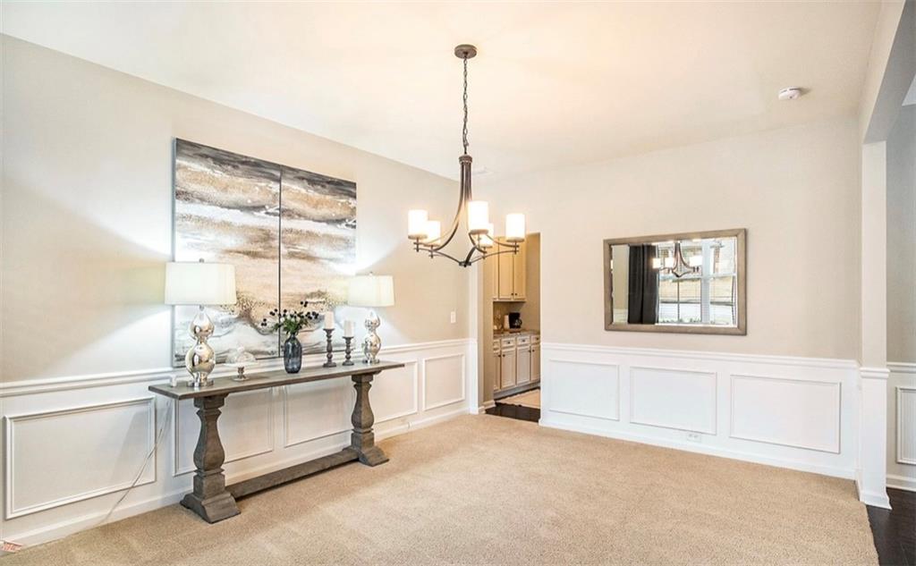 3217 Bowlin Drive Fairburn, GA 30213 - Photo 11 of 28 a living room with furniture a window and a glass door