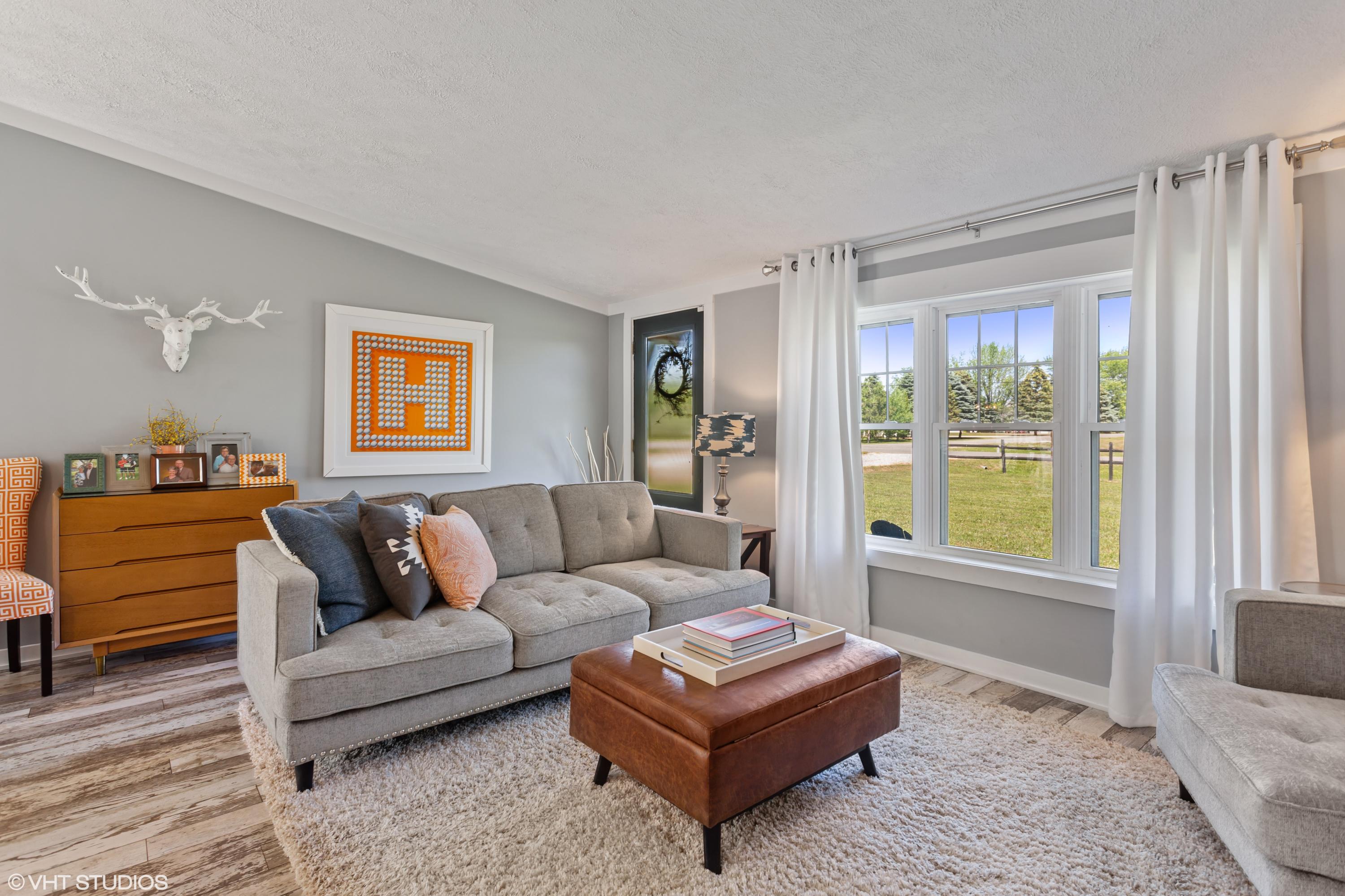 11714 Baldwin Road Bridgman, MI 49106 - Photo 2 of 15 02_11714BaldwinRd_1_LivingRoom_HiRes