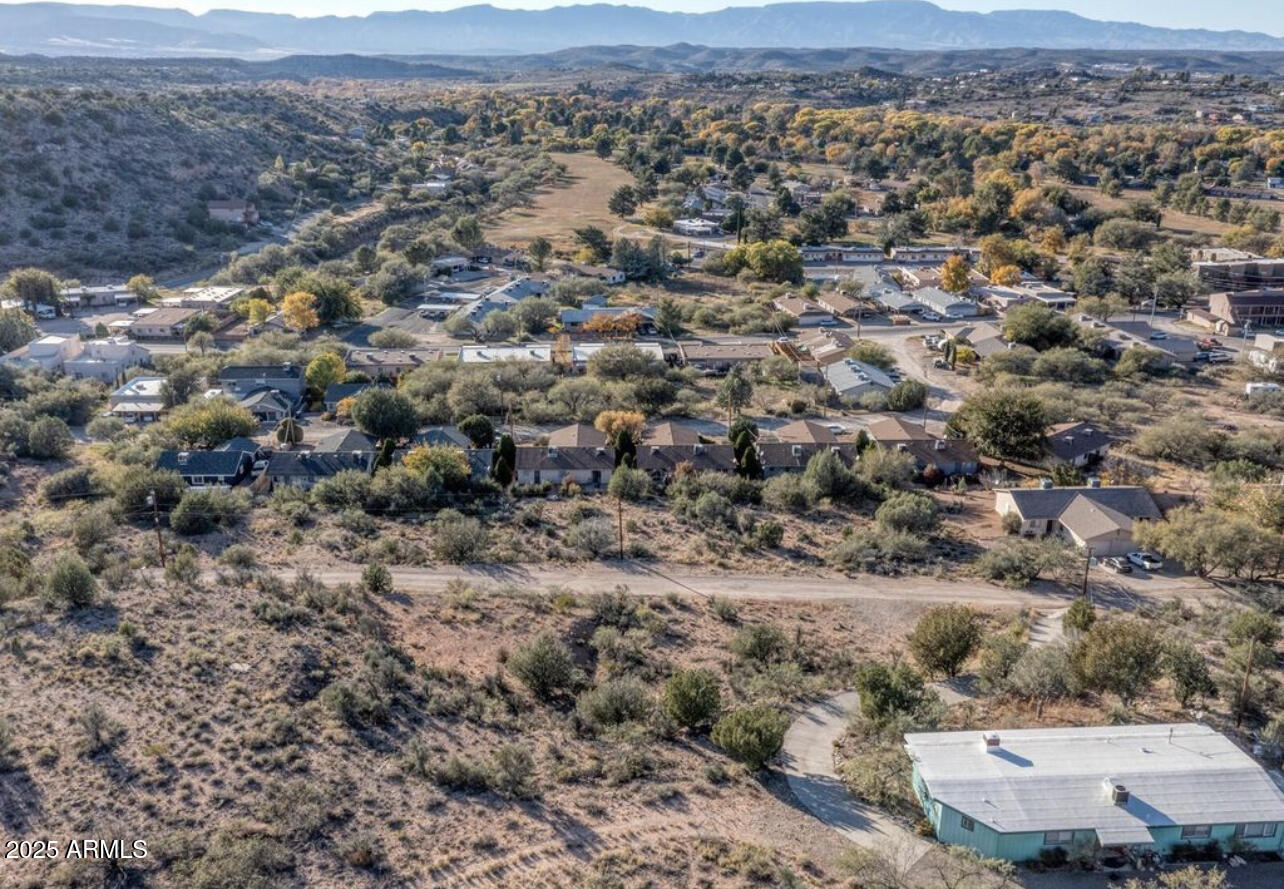 4320 East Valley Lane, Unit 45 Rimrock, AZ 86335 - Photo 2 of 4 an aerial view of a house with a yard and mountain view in back