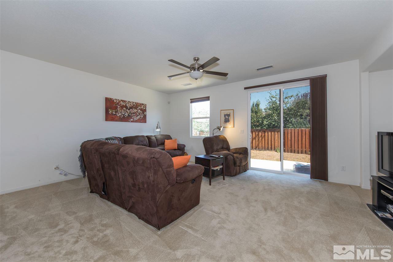 11370 Verazae Drive Reno, NV 89521 - Photo 3 of 17 a living room with furniture and a large window