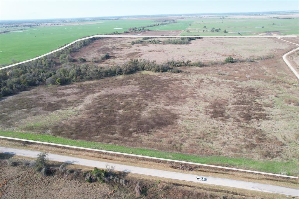 0 East Fm 413 Rosebud, TX 76570 - Photo 5 of 9 a view of a dry yard with trees