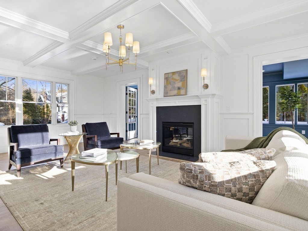 117 Abbott Road Wellesley, MA 02481 - Photo 11 of 34 a living room with furniture and a fireplace