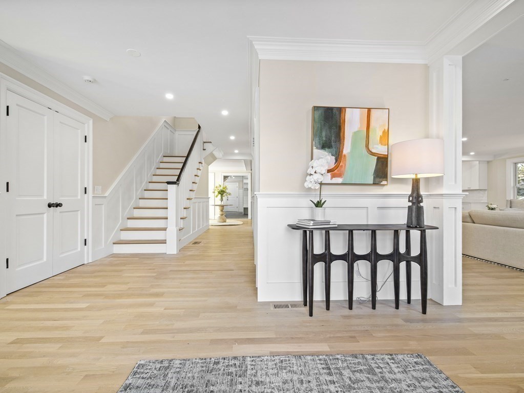 117 Abbott Road Wellesley, MA 02481 - Photo 16 of 34 a workspace with wooden floor and entryway