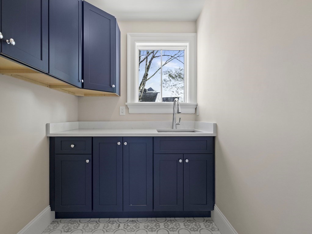 117 Abbott Road Wellesley, MA 02481 - Photo 23 of 34 a bathroom with a sink vanity and mirror