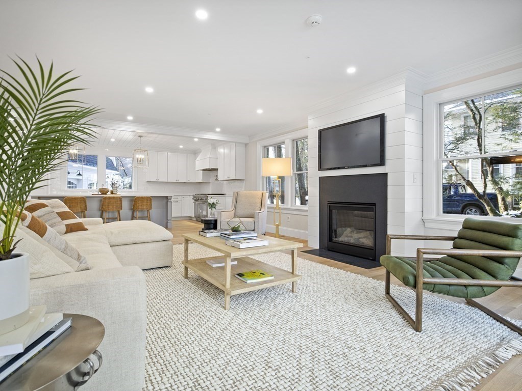 117 Abbott Road Wellesley, MA 02481 - Photo 5 of 34 a living room with furniture and a fireplace