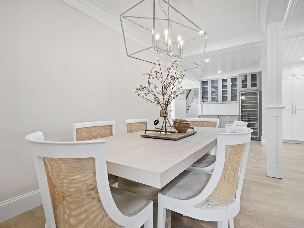 117 Abbott Road Wellesley, MA 02481 - Photo 9 of 34 a view of a dining room with furniture and chandelier