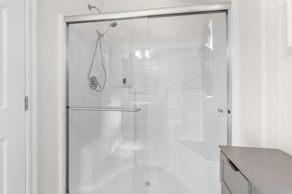 8545 Mission Gorge Road, Unit 253A Santee, CA 92071 - Photo 14 of 21 a bathroom with a shower and a glass door