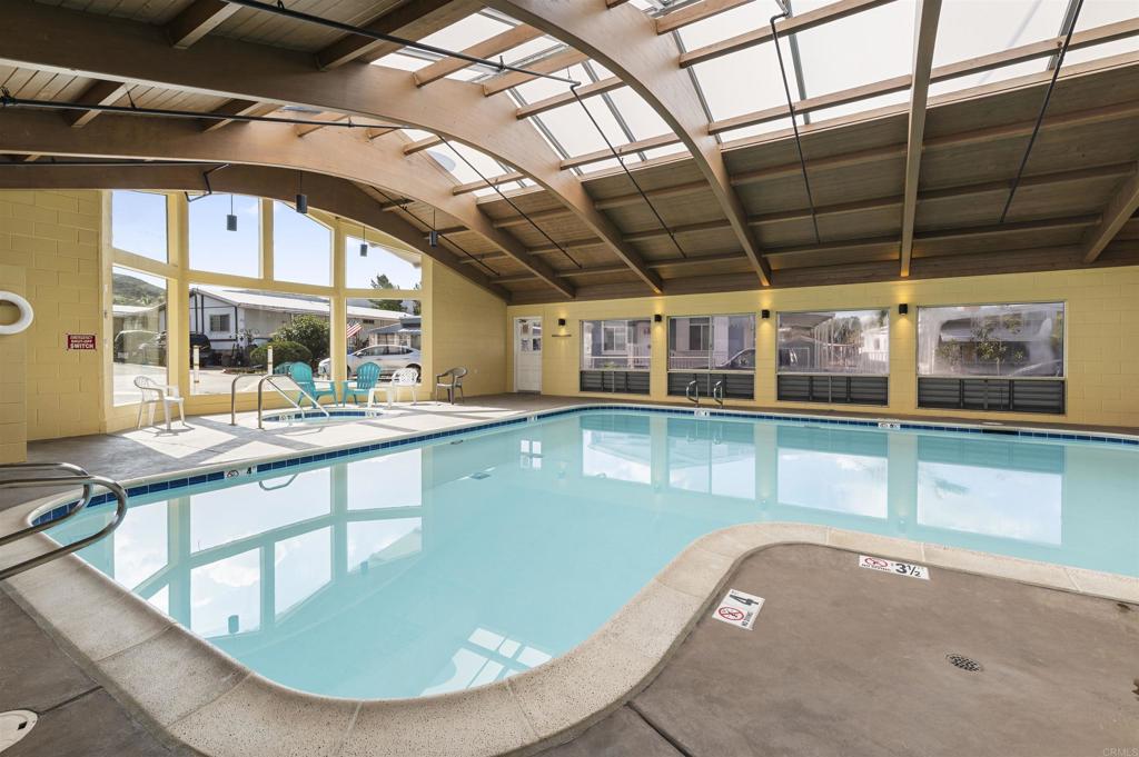 8545 Mission Gorge Road, Unit 253A Santee, CA 92071 - Photo 19 of 21 a view of a swimming pool with a chairs