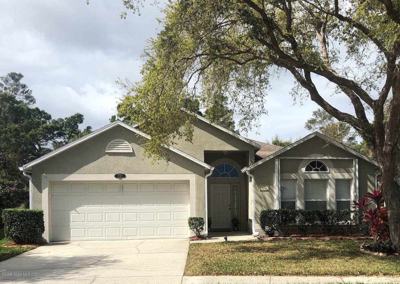 2114 Spring Creek Circle Palm Bay, FL 32905 - Photo 2 of 18 2114 FRONT