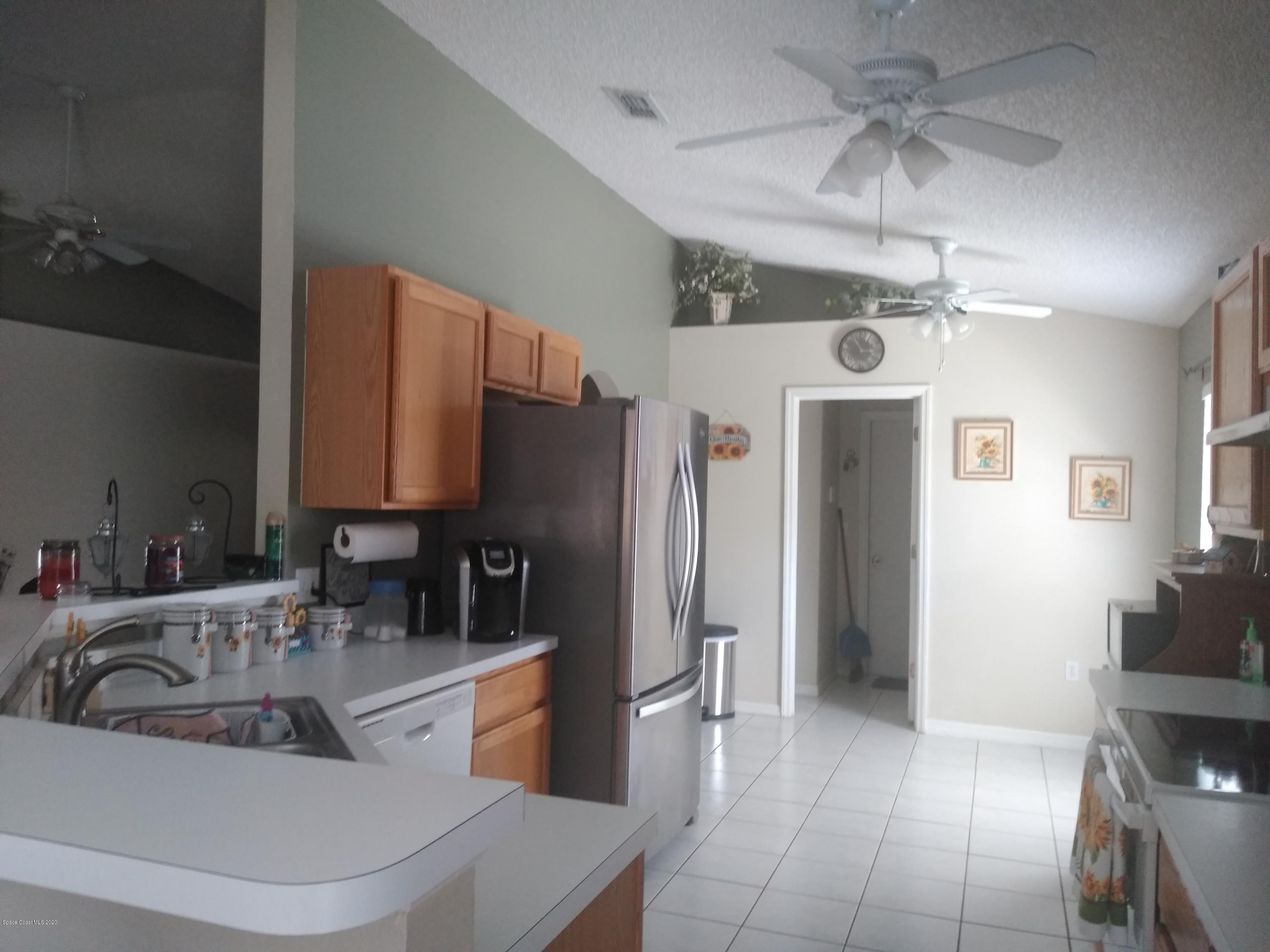 2114 Spring Creek Circle Palm Bay, FL 32905 - Photo 7 of 18 K1