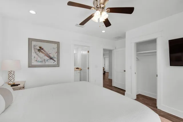 a view of a house with swimming pool and sitting area