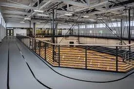 a view of a swimming pool with seating area