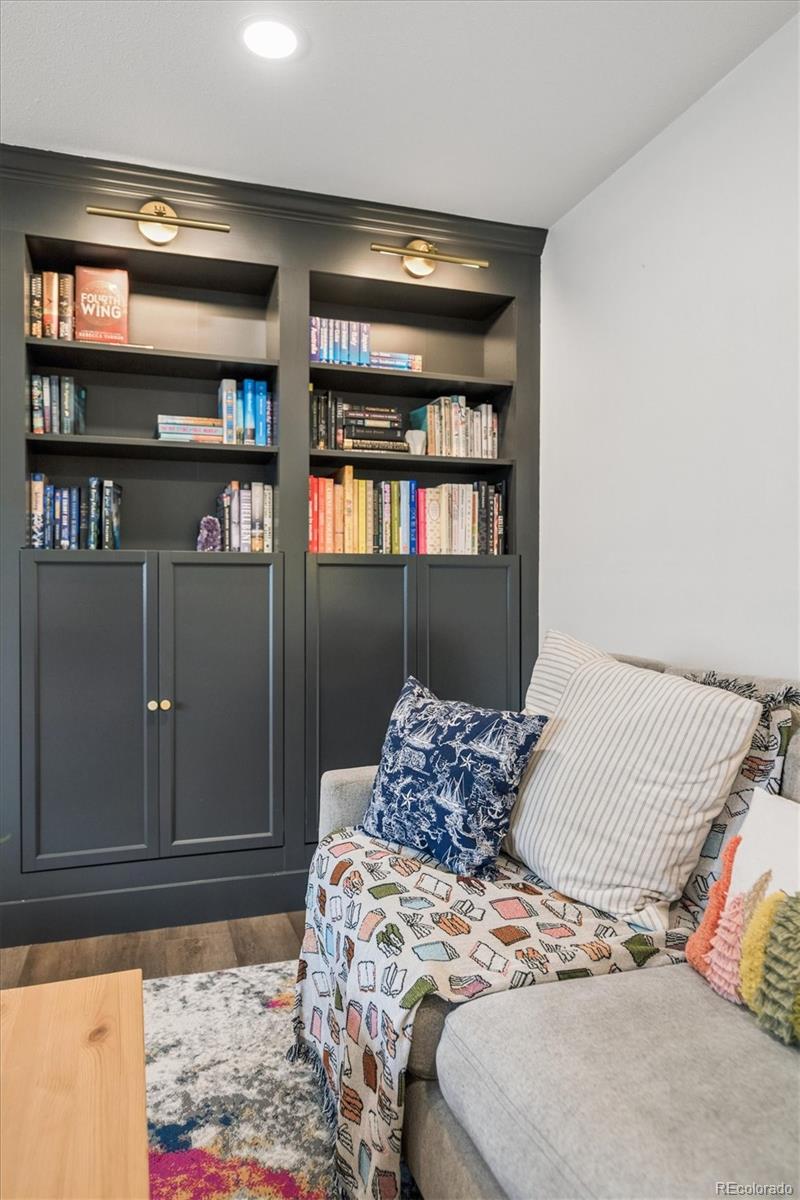8257 Yarrow Court Arvada, CO 80005 - Photo 15 of 38 a bedroom with a large bed and a window