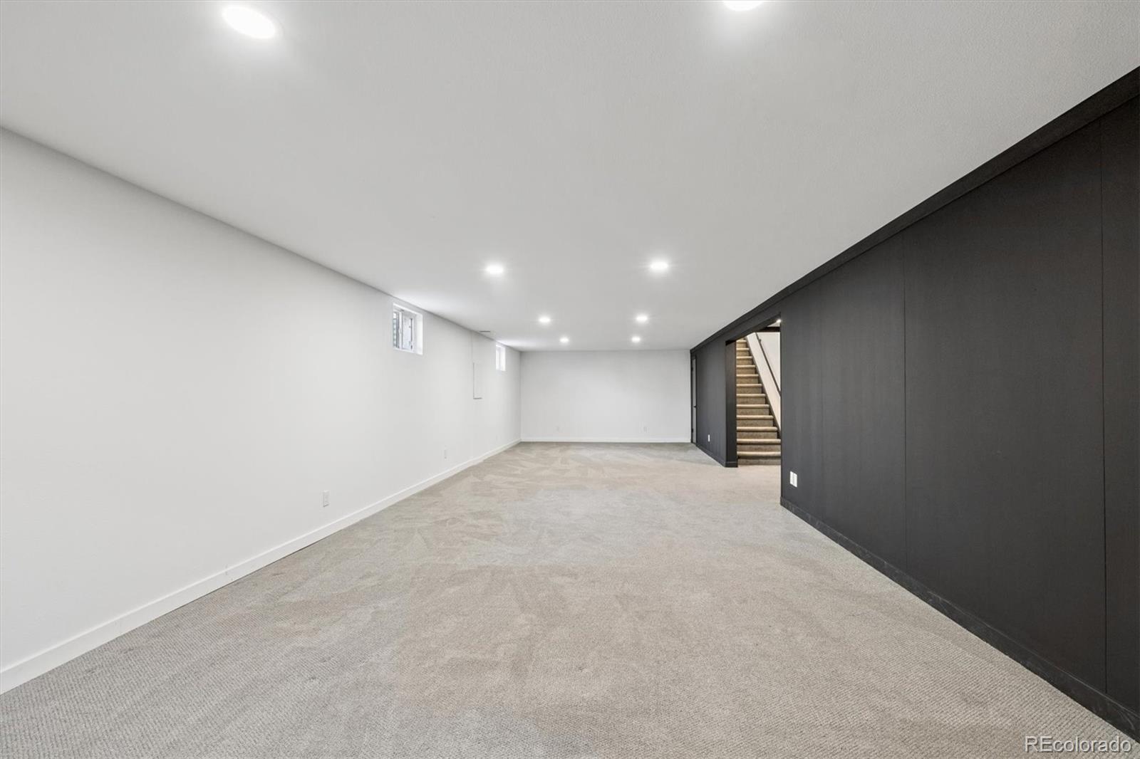 8257 Yarrow Court Arvada, CO 80005 - Photo 33 of 38 a view of an empty room with a window