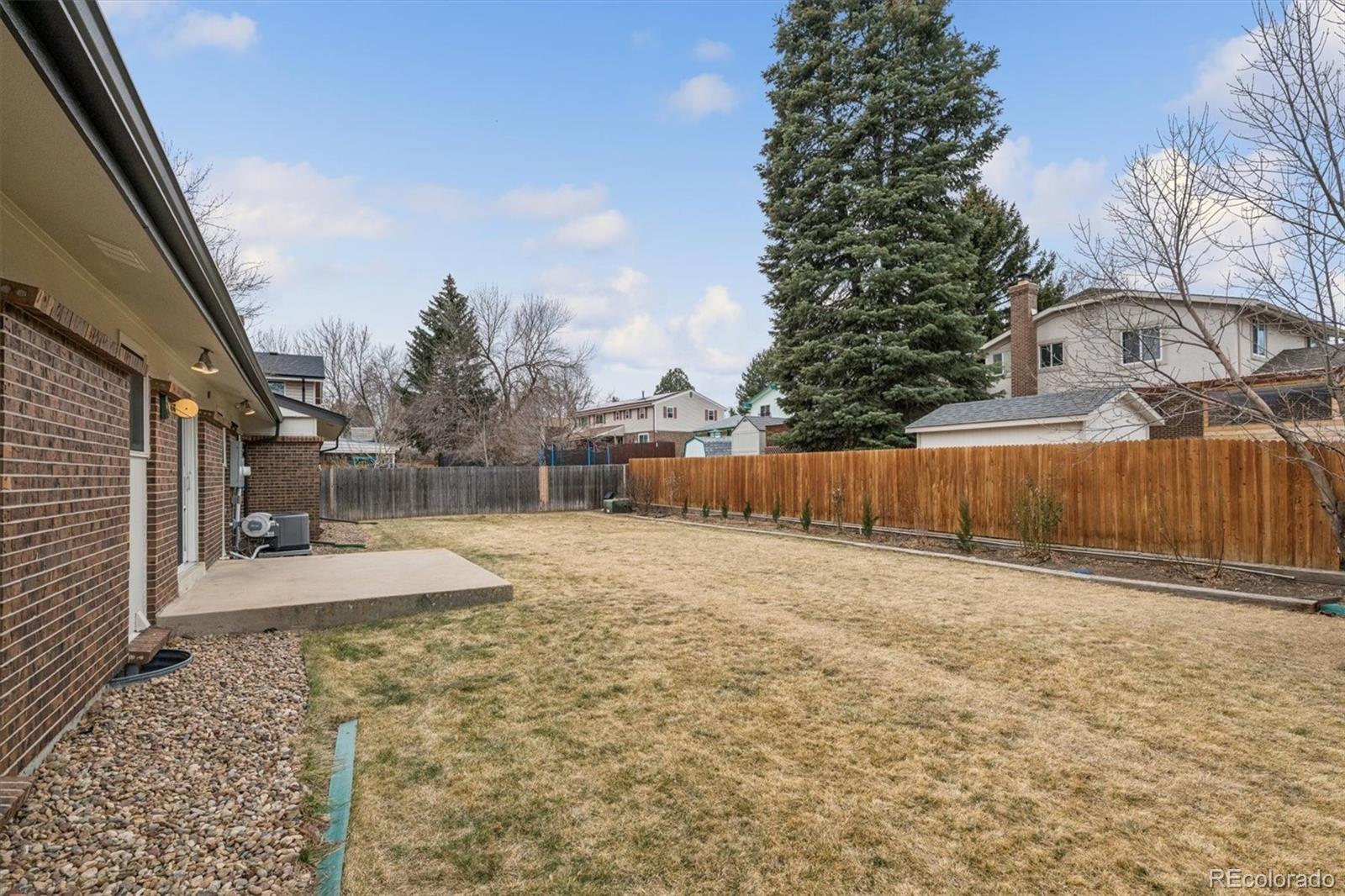 8257 Yarrow Court Arvada, CO 80005 - Photo 36 of 38 a view of a backyard